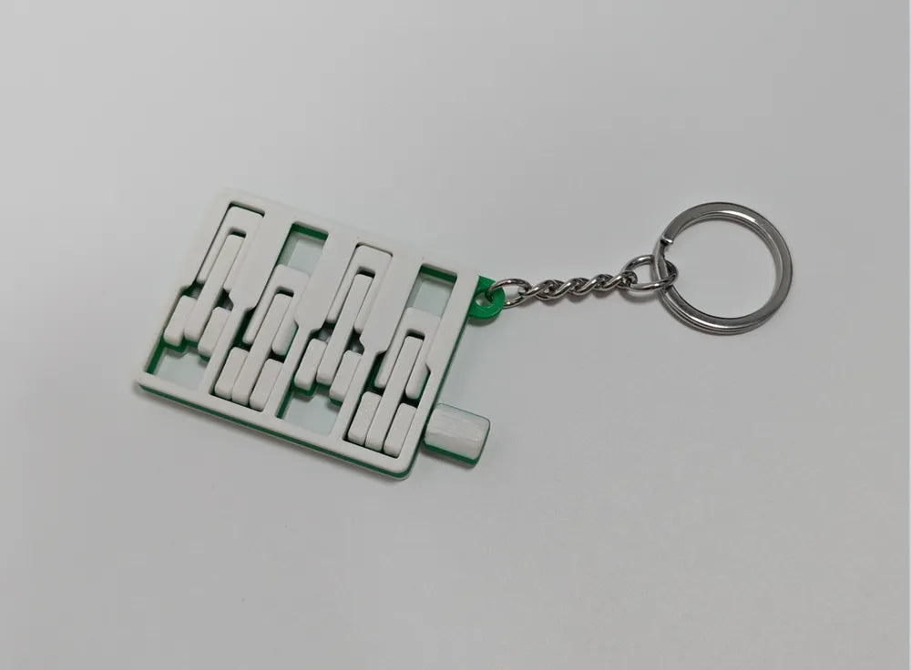 Articulated Engine Keychain ā Mini Mechanical Design