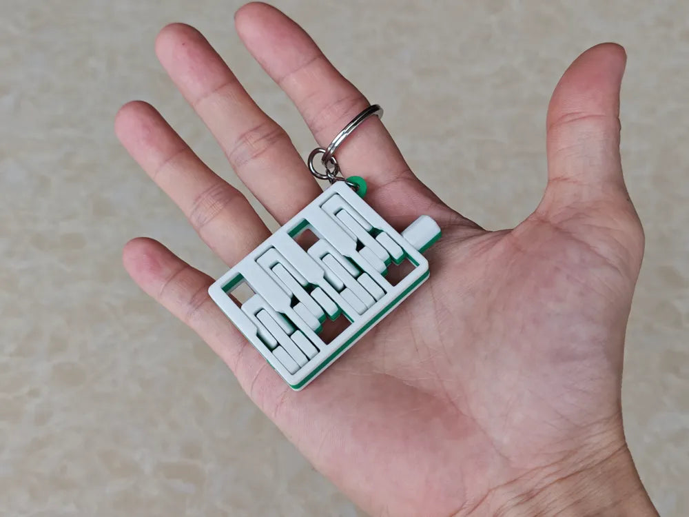 Articulated Engine Keychain ā Mini Mechanical Design